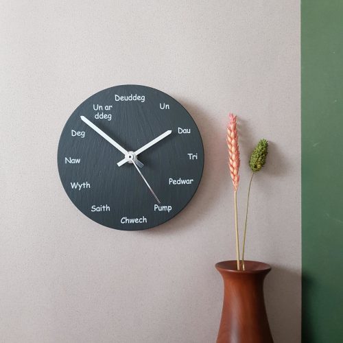 150mm Clock with Welsh Wording on wall by Inigo Jones Slate Works